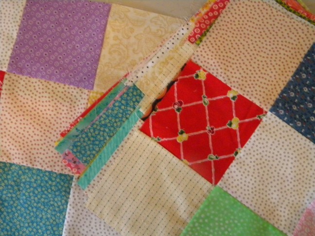 Some 9-patch blocks have the light squares in the corners; others have the print squares in the corners.